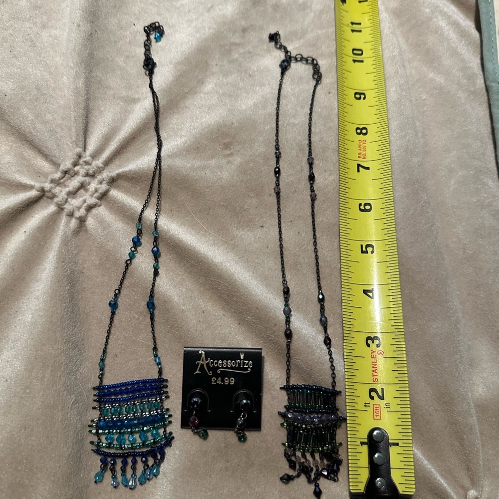 Two necklaces and earrings from England
